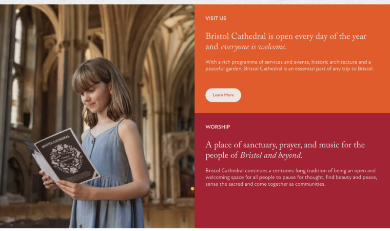 An image of a young white girl reading a programme with the cathedral in the backdrop. 